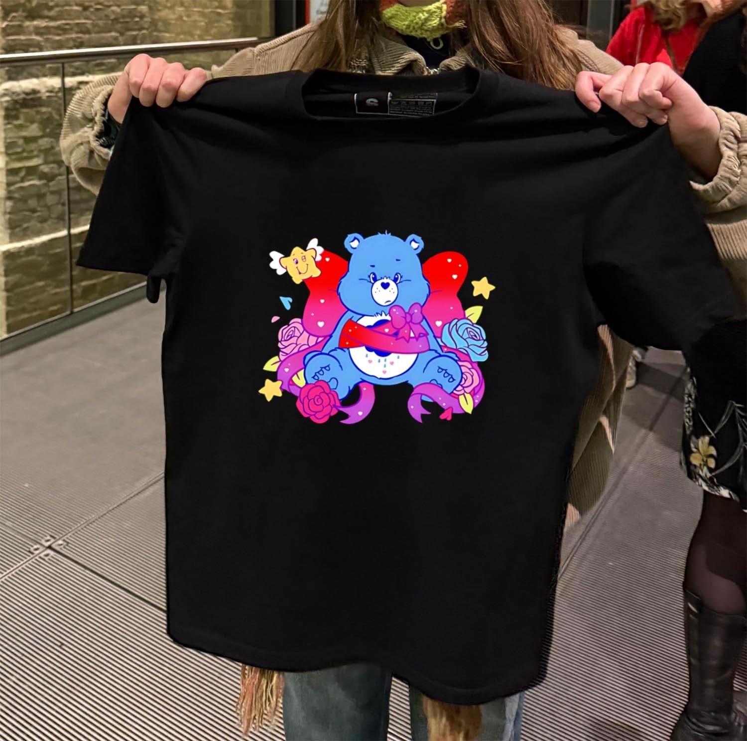 Grumpy Blue Care Bear With Pink Bow and Roses - Adult & Kids T-Shirts, Sweatshirts & Hoodies apparel design preview 2