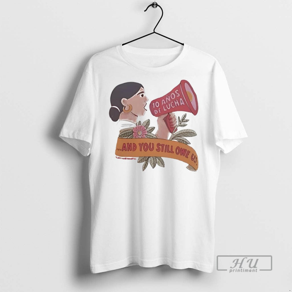 New 10 Anos De Lucha And You Still Owe Us - Adult & Kids T-Shirts, Sweatshirts & Hoodies apparel design preview 1