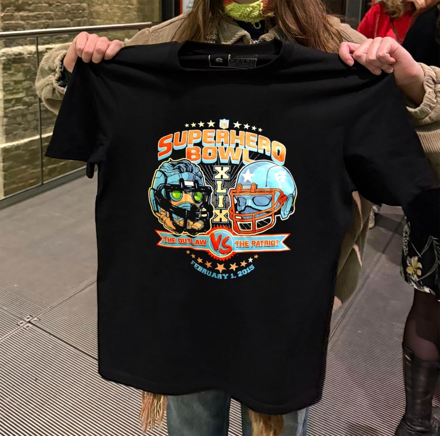 Superhero Bowl XLIX The Outlaw vs Patriot - Adult & Kids T-Shirts, Sweatshirts & Hoodies apparel design preview 2