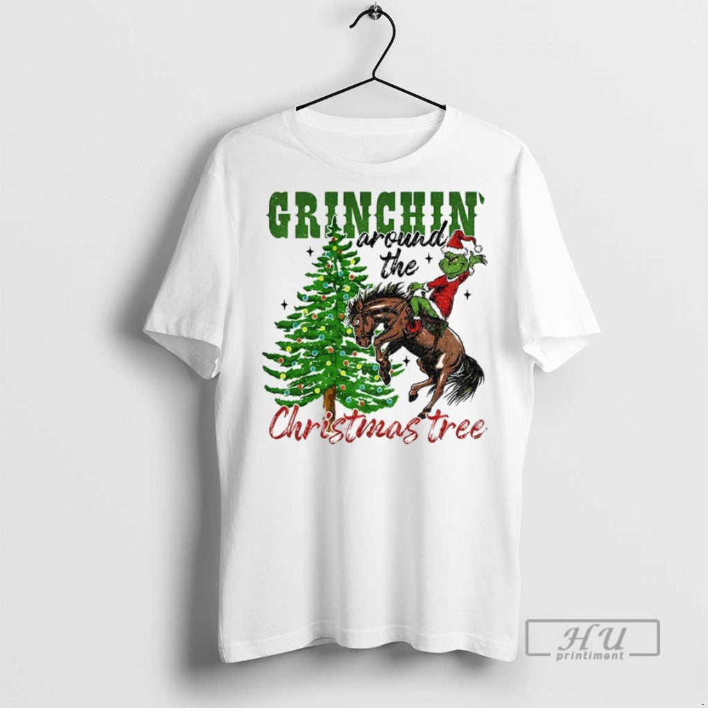 Trending Grinchin Around The Christmas Tree 2025 - Adult & Kids T-Shirts, Sweatshirts & Hoodies apparel design preview 1