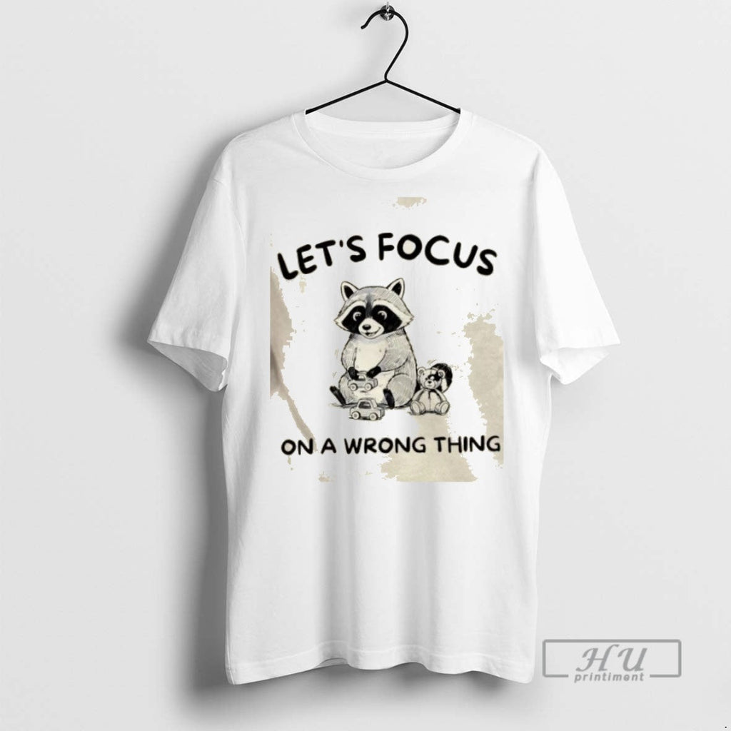 Trending Raccoon Lets Focus On A Wrong Thing Graphic - Adult & Kids T-Shirts, Sweatshirts & Hoodies apparel design preview 1