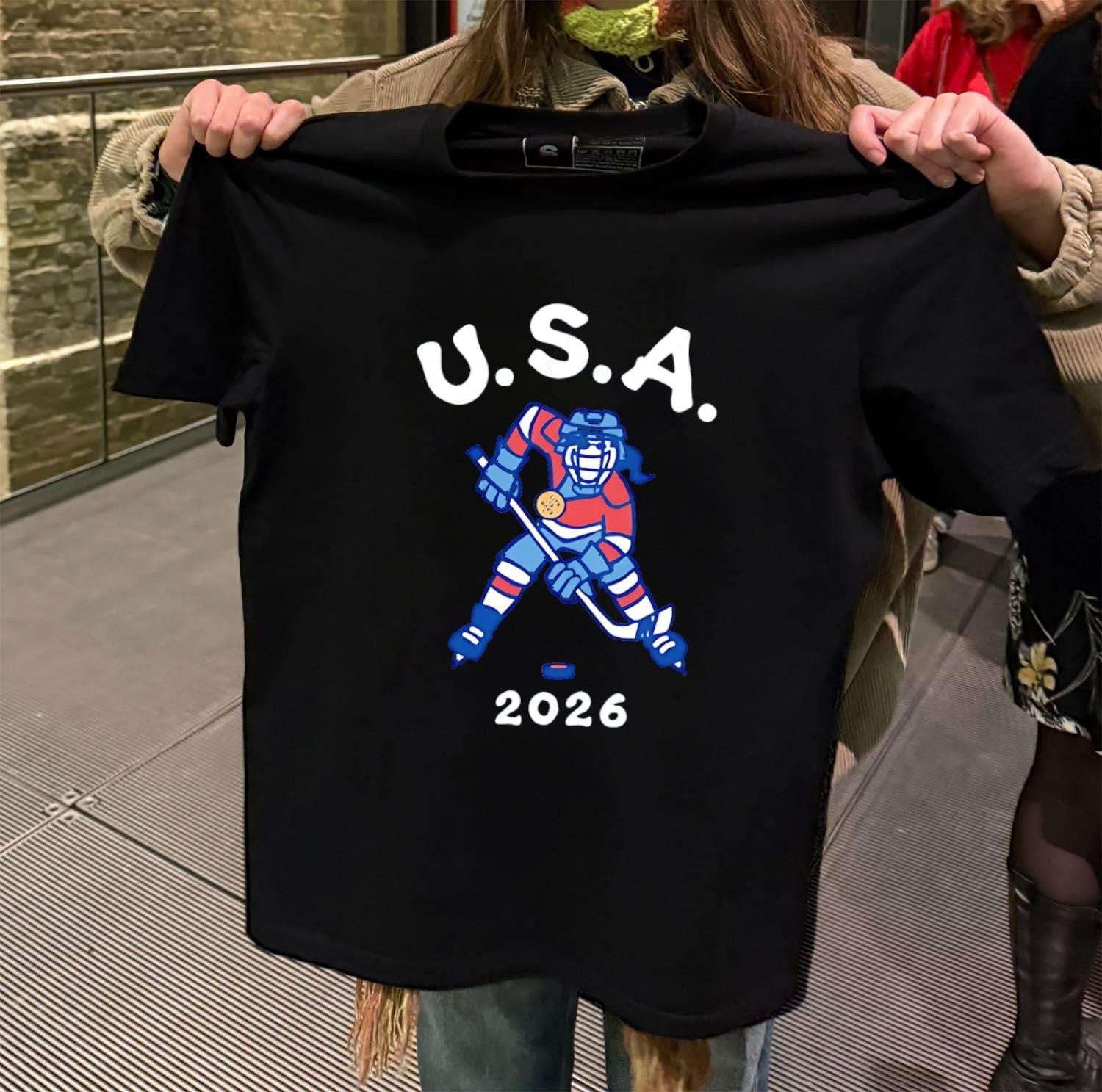 USA 2026 Women's Hockey Player With Gold Medal - Adult & Kids T-Shirts, Sweatshirts & Hoodies apparel design preview 2