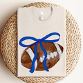 Royal Blue Bow Football Graphic - Adult & Kids T-Shirts, Sweatshirts & Hoodies apparel design preview 1